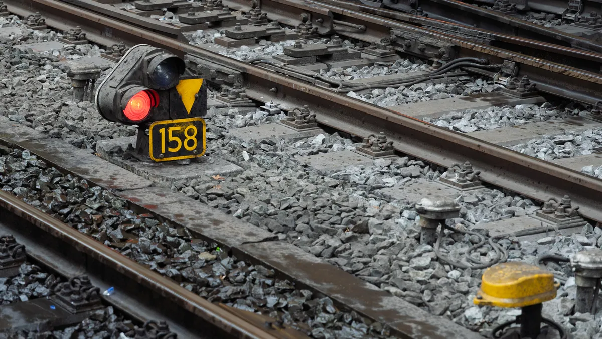 8 location signals models use to infer user geography and intent — Close-up of Train Tracks with Signal Light