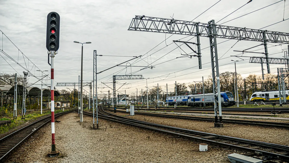 8 location signals models use to infer user geography and intent — Sleek Modern Train Station with Tracks and Signals