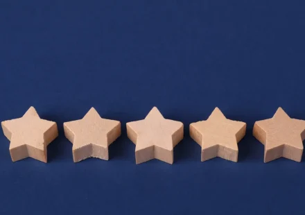 Five star rating icons on a blue background