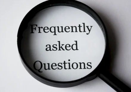 Magnifying glass over FAQ text